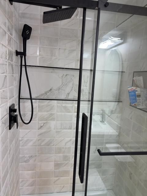 Glass shower - marble-look tile