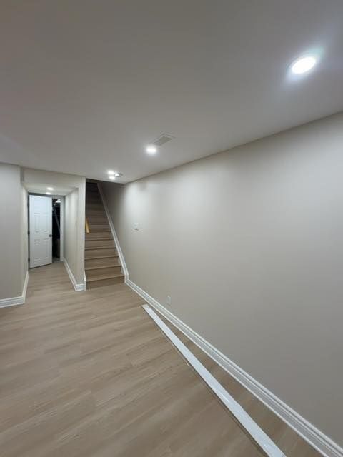 Basement hallway to stairs